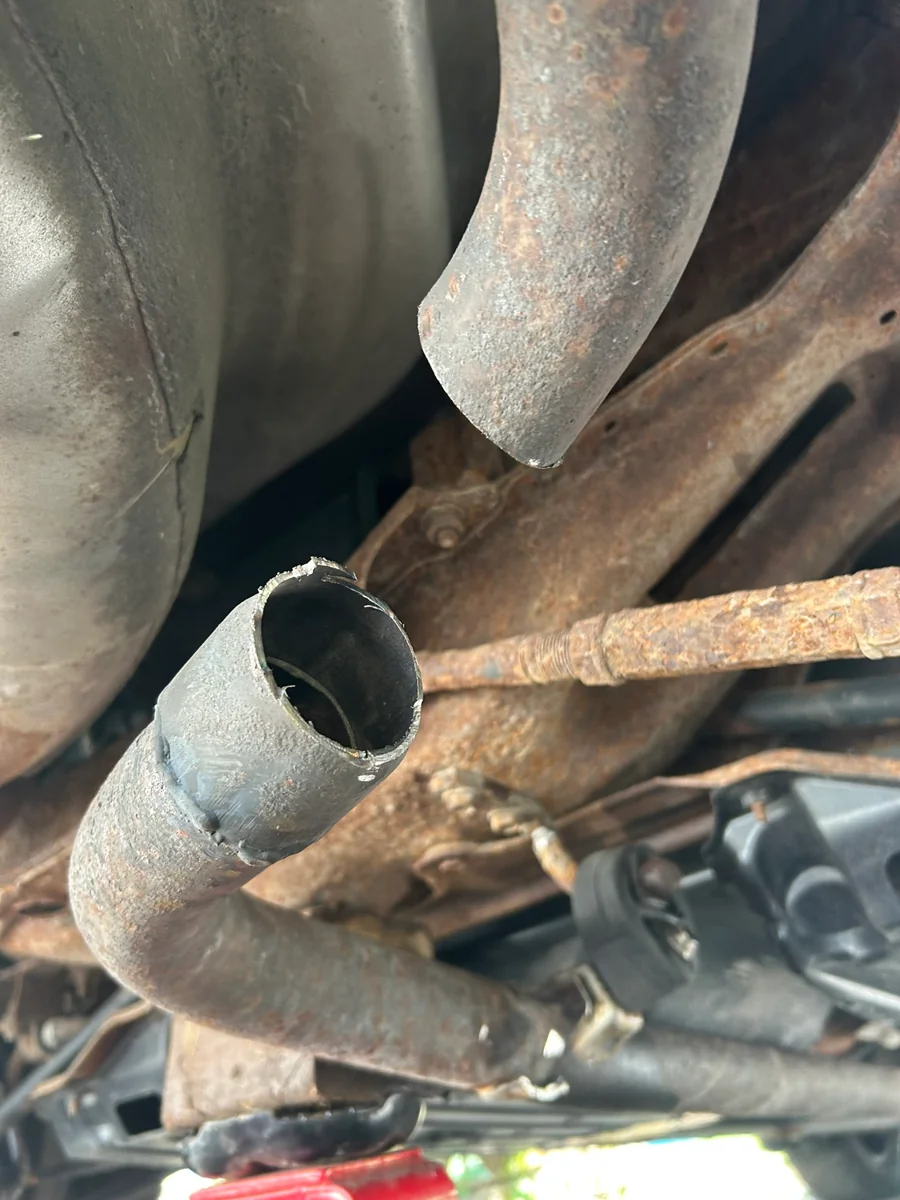 Actual broken rusted exhaust pipe photographed during a Cornwall Exhaust and Rust repair