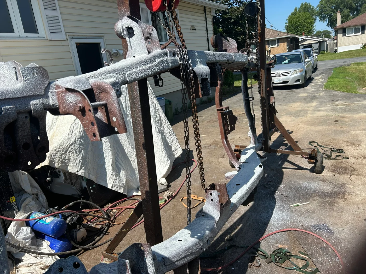 Actual vehicle frame restoration photographed by Cornwall Exhaust and Rust